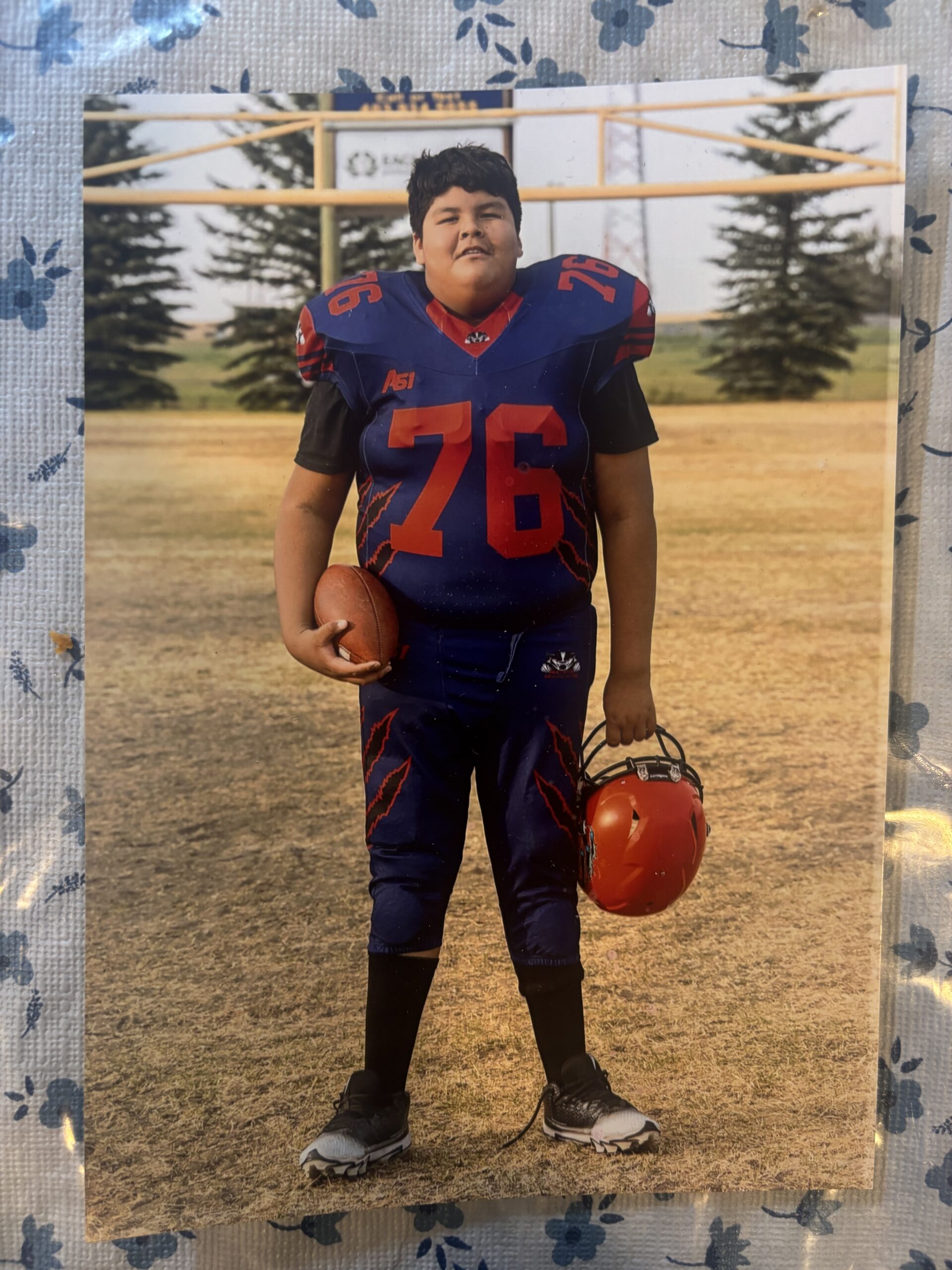 Frankie Wright Receives award playing football  